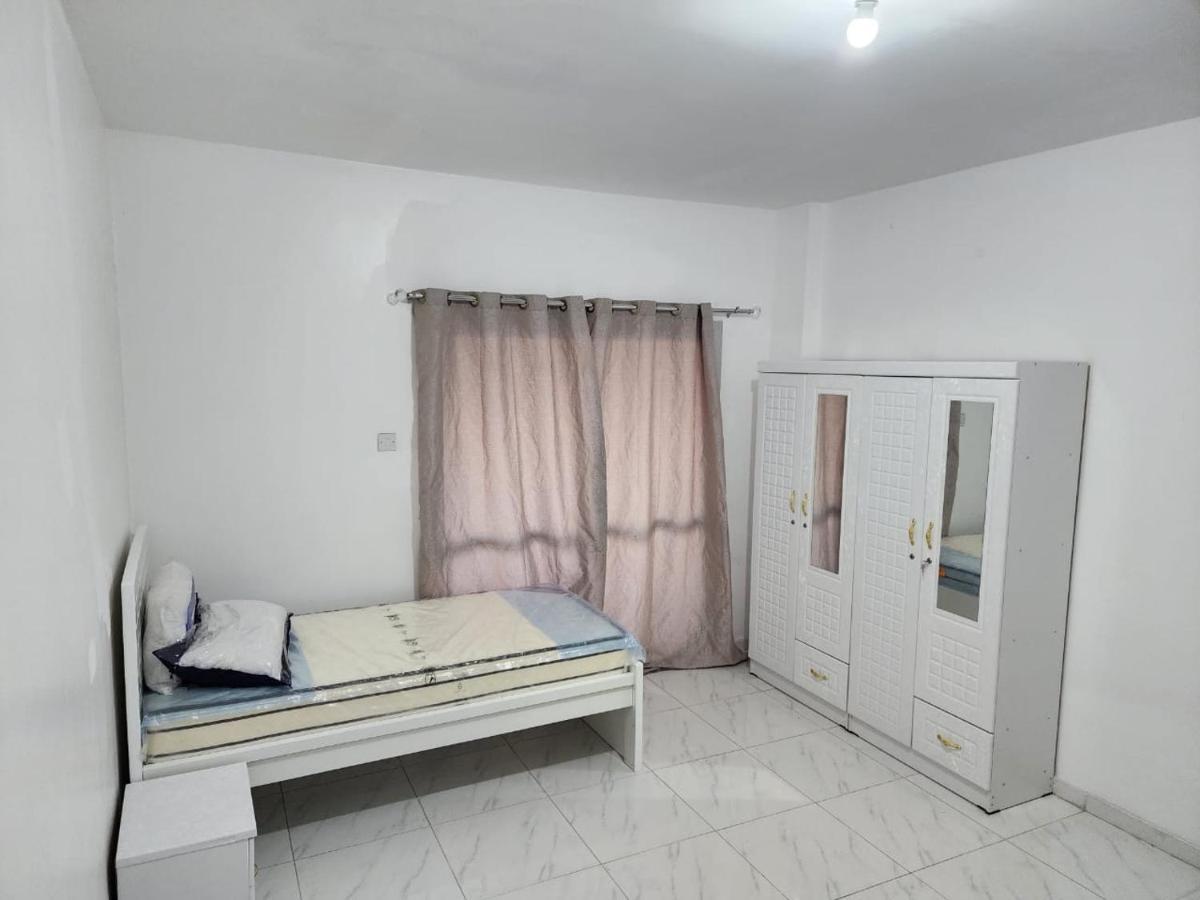 Sharing Motel Rooms Abu Dzabi Kültér fotó