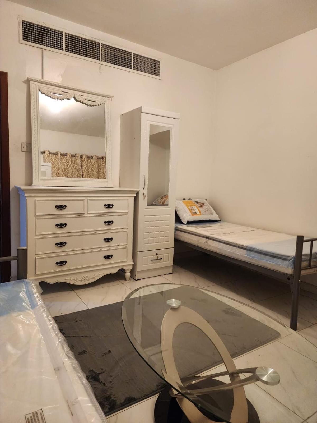 Sharing Motel Rooms Abu Dzabi Kültér fotó